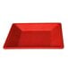 A red square Thunder Group Passion plate on a counter.