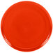 A red Fiesta China baking tray with a circle pattern and a black border.