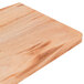 An American Metalcraft olive wood serving board with a close up of the wood surface.