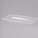 An American Metalcraft clear rectangular styrene platter with a handle.