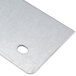 A metal rear cover plate for a Waring Panini Grill with a white circle in the middle.