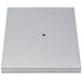 A white rectangular metal plate with a hole in the middle.