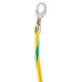 A yellow and green Waring lead assembly cable with a round metal ring.