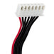 A white and black cable with red and black wires attached to a white electrical device with two toggle switches.