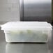 A white Rubbermaid polyethylene food storage box with a lid.