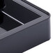 A black rectangular Bunn drip tray on a counter.