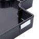 A black plastic tray with a silver handle and latch.