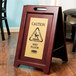 Rubbermaid 1867507 23 1/2" 2-Sided Wooden Brass Plated Executive Wet Floor Sign Main Thumbnail 1