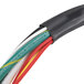 A close-up of a black and white cable with multiple colors.
