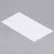 A pack of white Durable Packaging deli sheets on a gray surface.