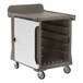 A white and brown Cambro meal delivery cart with a door.