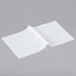 Durable Packaging white interfolded deli sheets on a white background.