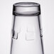 A close up of a Libbey stackable beverage glass.