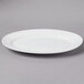 A CAC Harmony super white porcelain platter with a rim.