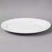 A white porcelain oval platter.