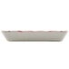 A white rectangular GET Bella Fresco melamine tray with a red rim.