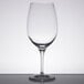 A clear Stolzle Bordeaux wine glass on a table.