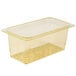 A yellow plastic Cambro colander pan with holes on the bottom.