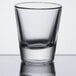 A close up of a Libbey shot glass with clear glass on top.