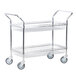 A chrome metal cart with two shelves and wheels.