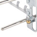 A Waring moving bracket assembly with two metal rods and a handle.