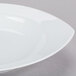 A CAC Camptown pasta bowl with a small rim on a grey surface.