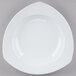 A white china pasta bowl with a circular edge.