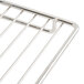 A close up of a stainless steel wire rack with a handle.