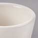 A close up of a white cup.