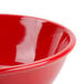A close up of a pure red Thunder Group melamine bowl.