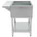 An Eagle Group stainless steel open well electric hot food table with two pans on a counter.