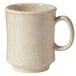 A beige bamboo melamine coffee mug with a handle.