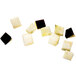 A black and white Robot Coupe dicing kit square with cubes of black and white food.