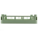 A Vollrath light green plastic dish rack with extended open sides and compartments.