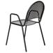 An American Tables and Seating black metal outdoor chair with a black mesh back.