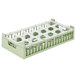 A light green plastic Vollrath half-size rack with 18 compartments.