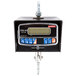 A black Tor Rey digital crane scale with a screen and hook.