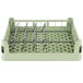 A light green Vollrath dish rack with metal rods for four trays.