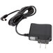 A black ac adapter with a cord attached to it on a white background.