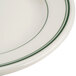 A close-up of a Homer Laughlin white plate with a green stripe on the rim.