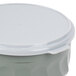 A gray plastic lid on a Dinex Turnbury container.