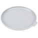 A white plastic lid with a small circle.