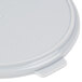 A white plastic Dinex Turnbury lid with a handle.