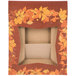 A brown box with a window and autumn leaves on it.