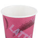 A Solo pink paper hot cup with a Bistro print.