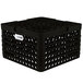 A black plastic Vollrath Traex Plate Crate with 12 compartments.