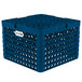 A blue Vollrath Traex Plate Crate with compartments for plates and holes.