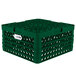A green plastic Vollrath Traex Plate Crate with 12 compartments for plates.
