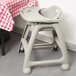 Lancaster Table & Seating Ready-To-Assemble Gray Stackable Restaurant High Chair with Tray and Wheels Main Thumbnail 1