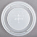 A white plastic lid with the text "Dinex" and a cross.